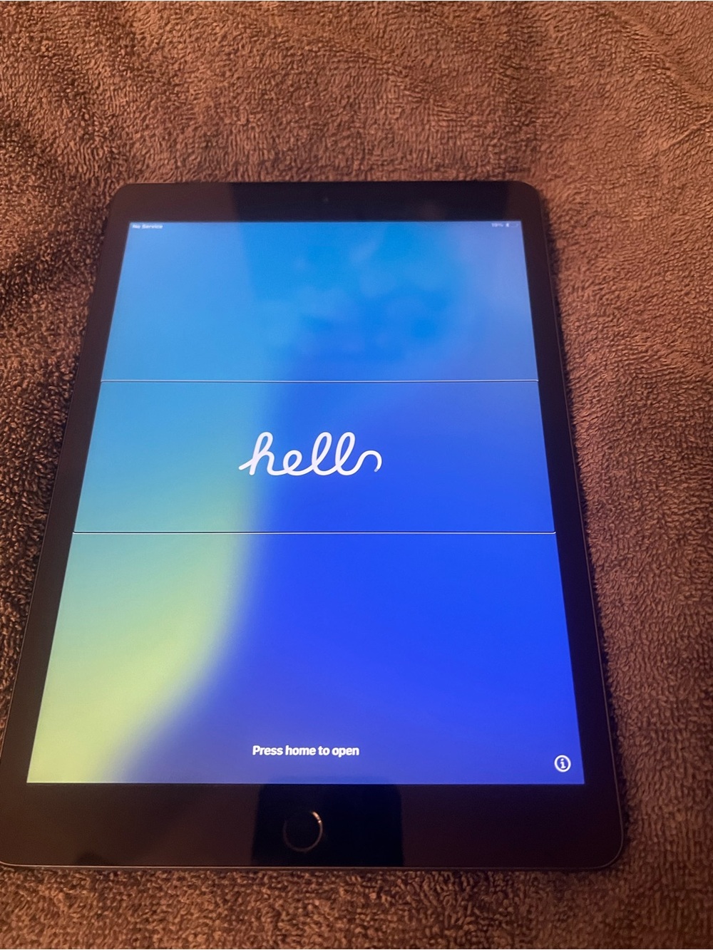 Apple iPad with Black Bezel and Blue Gradient Display